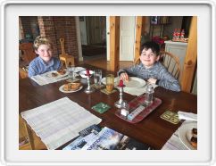 John and Reid Eating Cookies at Breakfast  